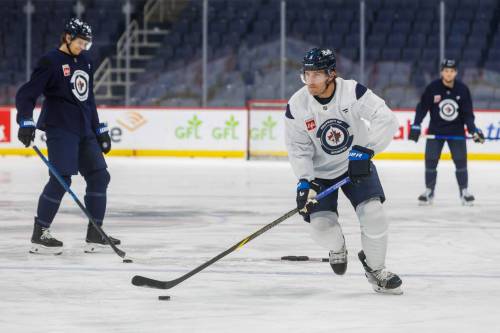 MIKE DEAL / FREE PRESS
                                Defenceman Luke Schenn started last week as a member of the Nashville Predators, got traded to Pittsburgh and then to Winnipeg. He will wear number five with the Jets.
